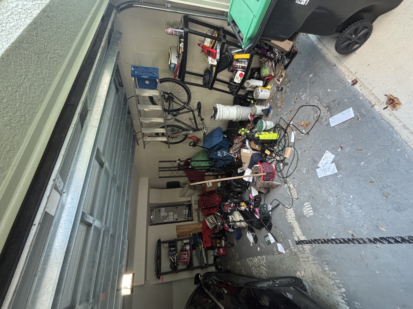 Driveway full of items ready for junk hauling