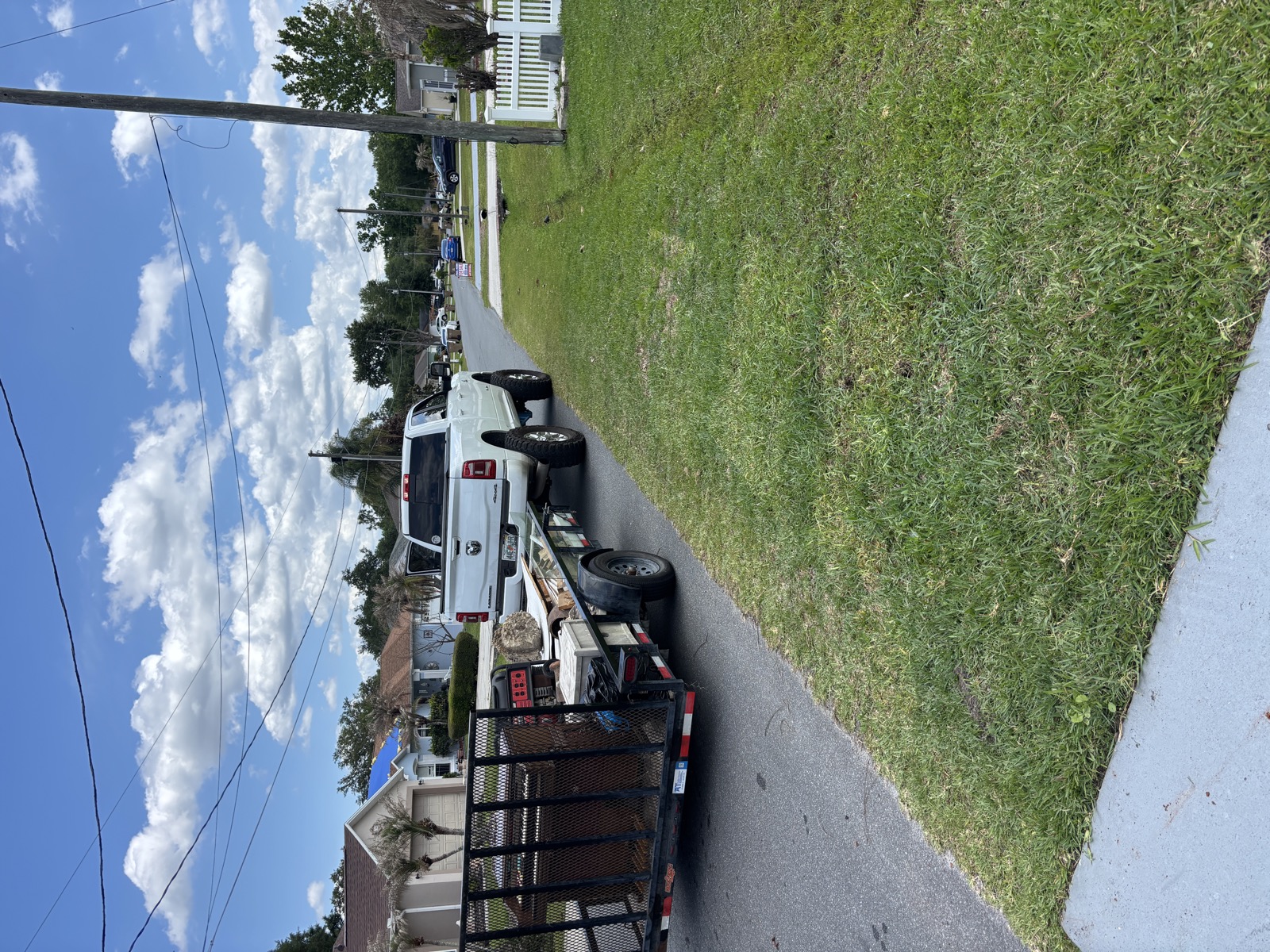 Dump it Done truck and trailer on the road
